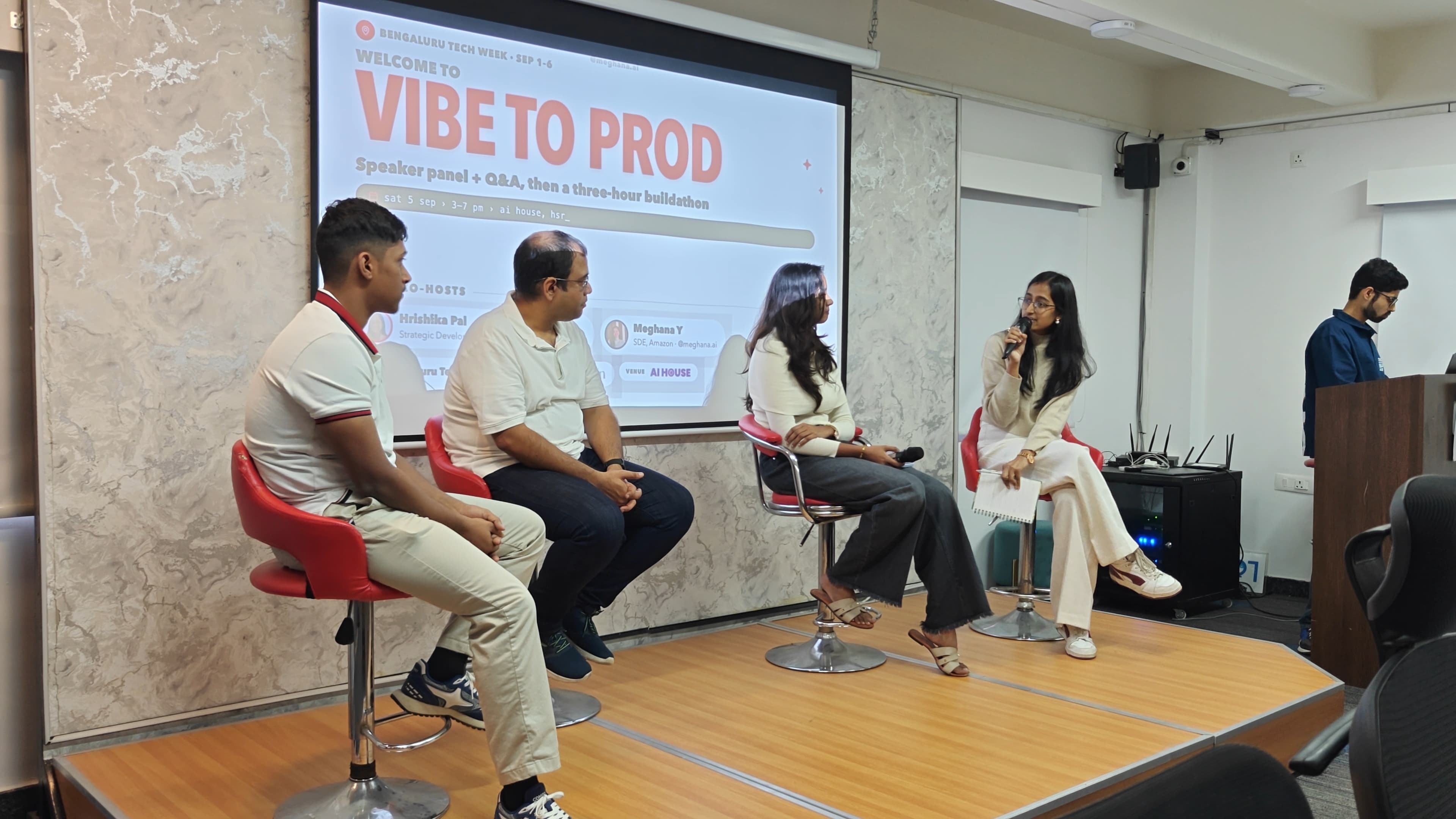 Hrishika Pal hosting a speaker panel at Vibe to Prod